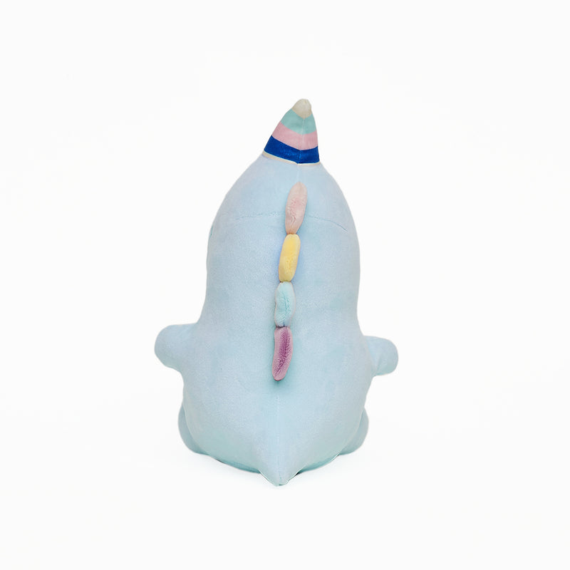 Morbido peluche a forma di dinosauro seduto colore celeste con corno multicolore