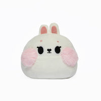 Morbido peluche squishy a forma di coniglietto rosa.