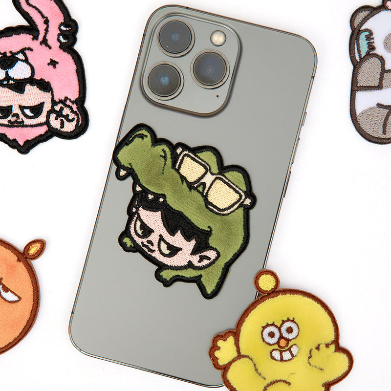 Patch ricamati in versione Blind Box. La collezione completa è composta da 20 personaggi più due rari.