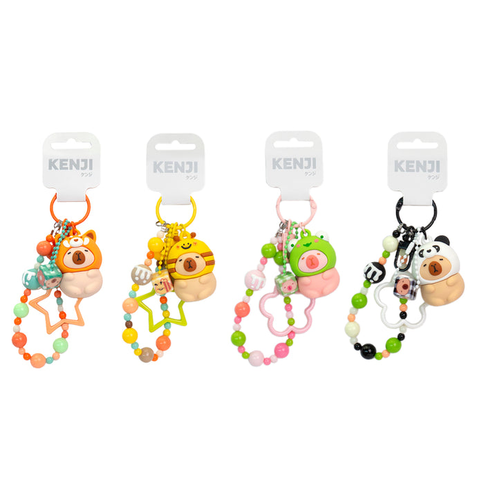 Portachiavi capibara con cappuccio da animaletto kawaii disponibile in 4 varianti: capibara apetta, capibara panda, capibara rana, capibara volpina.