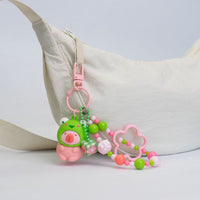 Portachiavi capibara con cappuccio da animaletto kawaii disponibile in 4 varianti: capibara apetta, capibara panda, capibara rana, capibara volpina.