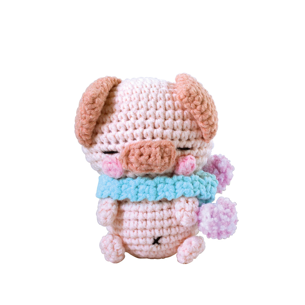 Kit completo per realizzare un grazioso maialino all'uncinetto.