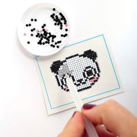 Kit completo per realizzare il mosaico di un panda.