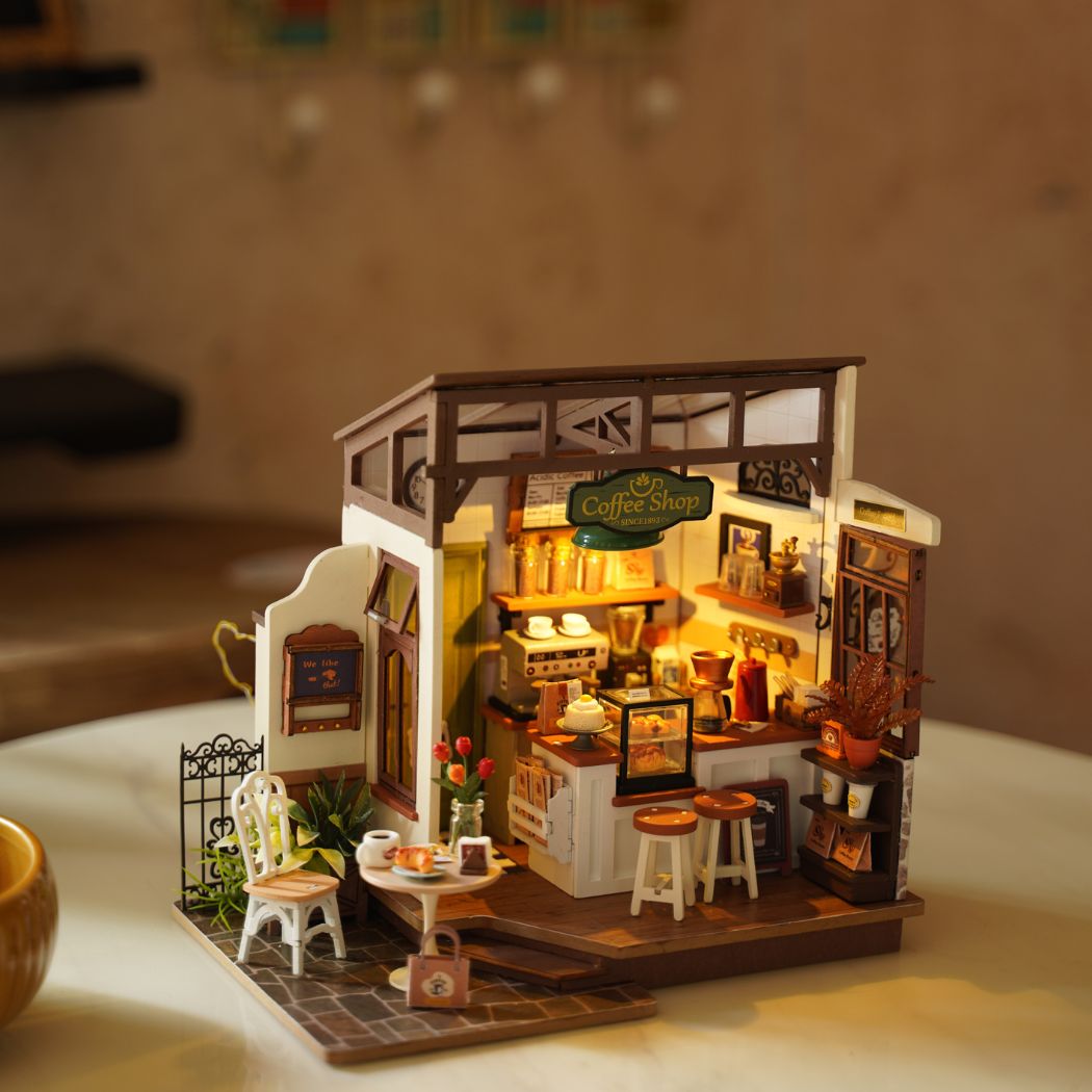 Puzzle in 3d che riproduce in miniatura la scena in un piccolo caffè