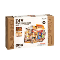 Puzzle in 3d che riproduce in miniatura l'angolo di una libreria dal sapore vintage