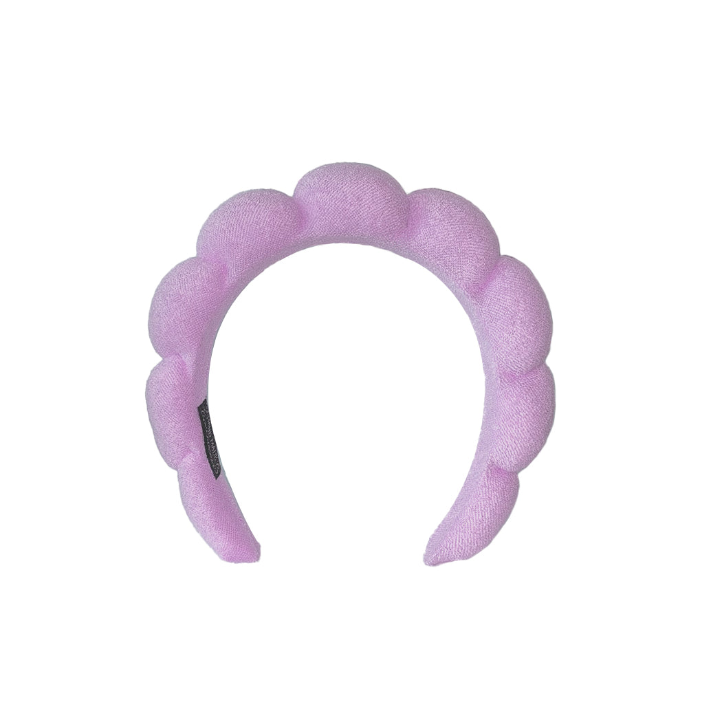 Il cerchietto più iconico del momento per iniziare la tua routine di bellezza. Disponibile in 8 colori diversi.