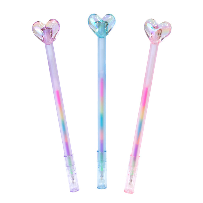 Penna gel con inchiostro arcobaleno e tappo a forma di cuore.