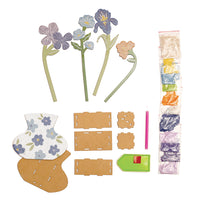 Kit di diamond painting per realizzare un vaso con i fiori.