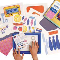 Kit con tutto l'occorrente per realizzare una decorazione in carta a tema sardine.
