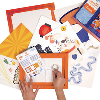 Kit con tutto l'occorrente per realizzare una decorazione in carta a tema ramen.