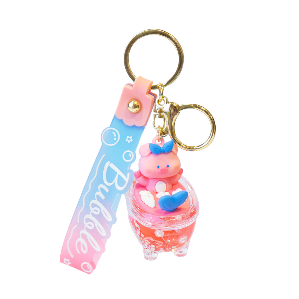 Portachiavi divertente con un tenero animaletto nella vasca da bagno.