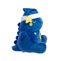 Peluche di un dinosauro in versione nanna.