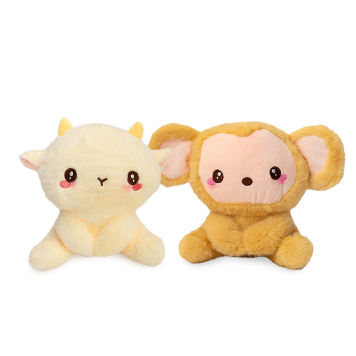 Peluche fluffy di una scimmietta e di una capretta.