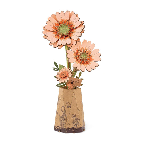 Puzzle in 3d che riproduce un fiore di gerbera arancio.