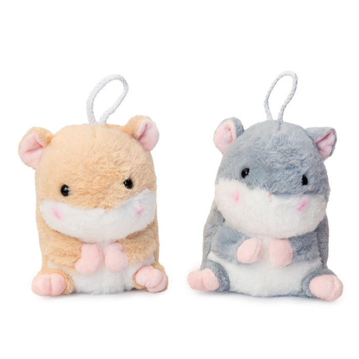 Peluche fluffy di un criceto seduto.