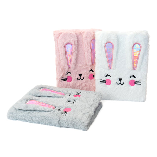 Quaderno in formato A5 con copertina pelosa a forma di coniglietto.