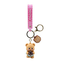 Portachiavi di Butter Bear Serie 1.
Il portachiavi è disponibile in 4 varianti: rosa, celeste, verde, giallo