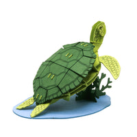 Puzzle in 3d in cartoncino che riproduce una tartaruga marina.