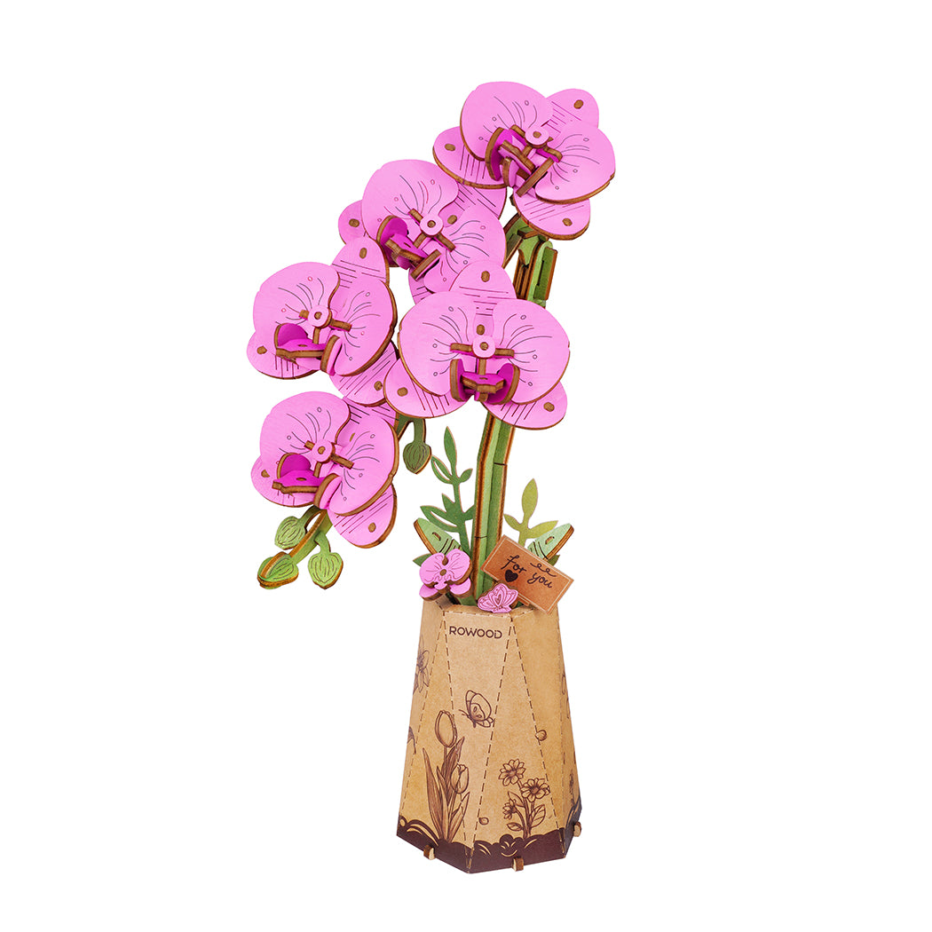 Puzzle in 3d che riproduce un  orchidea rosa.