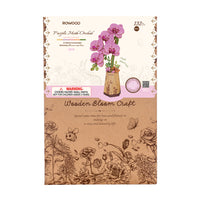Puzzle in 3d che riproduce un  orchidea rosa.