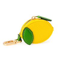 Portachiavi a forma di limone. Ha una piccola tasca richiudibile con zip.
