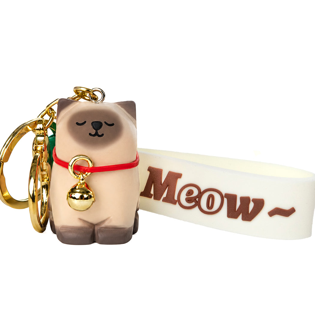 Portachiavi a forma di gattino marrone.