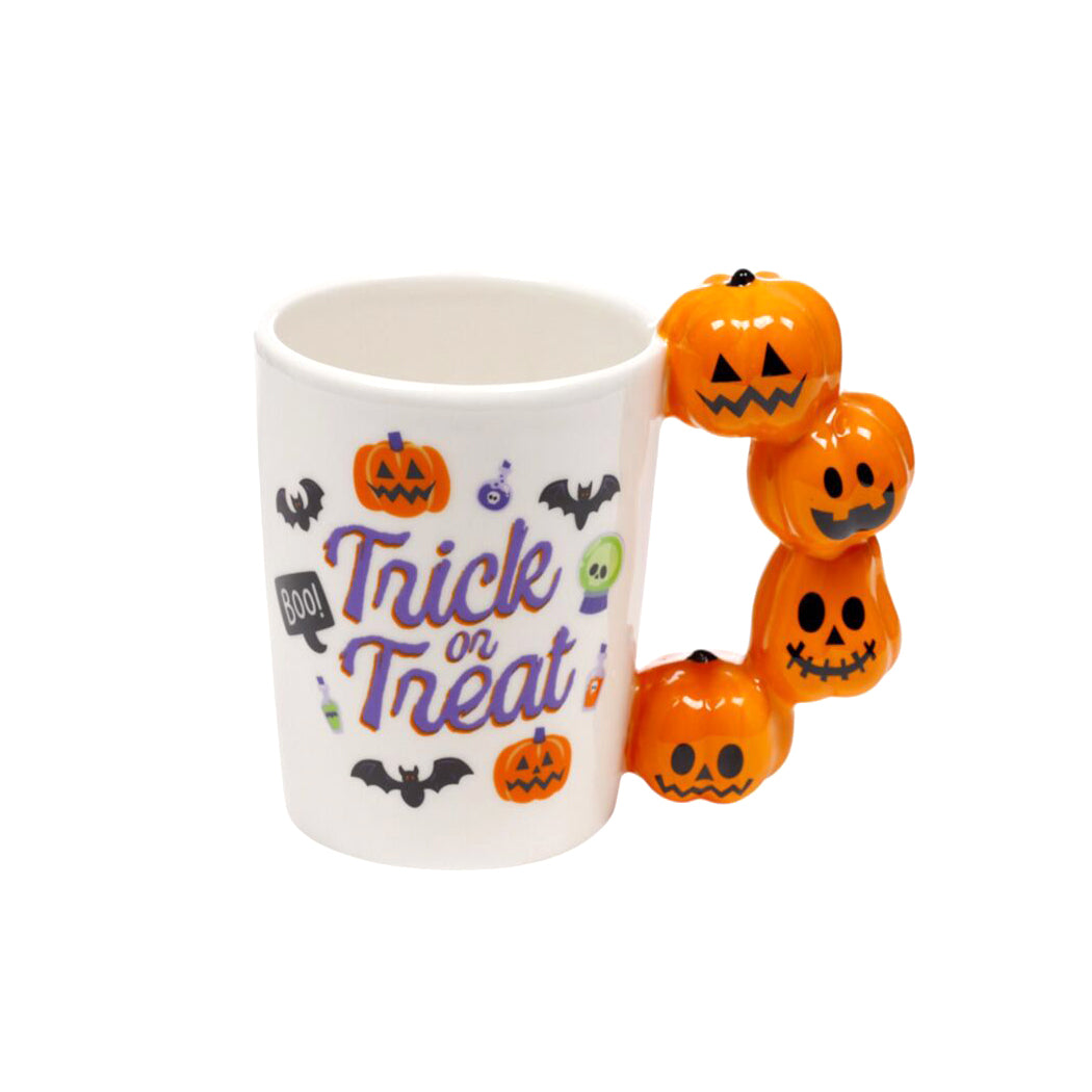 Tazza di Halloween con manico a forma di zucche.